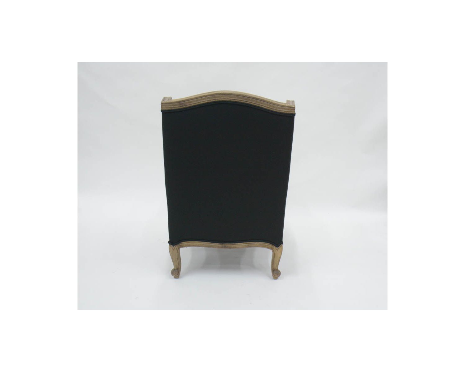 Sillón bergère «Sofía» de madera maciza y tela blanca y negra con rombos