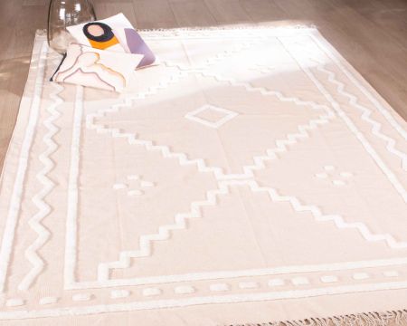 Alfombra beige tejida a mano con motivos bordados en blanco «Matis», de 120 x 180 cm