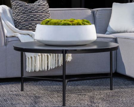 Mesa de centro redonda de aluminio con tablero de cerámica negro «Lazy Beach», de 62 cm de diámetro