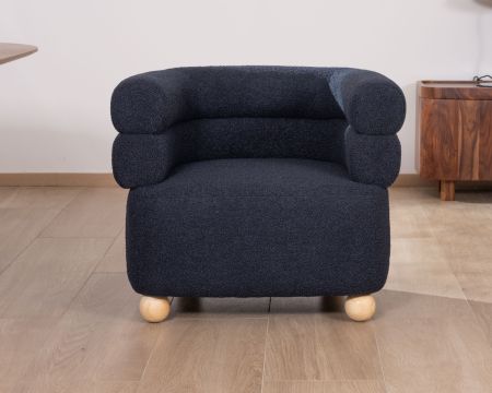 Pequeño sillón envolvente de tela azul oscuro «Wala»