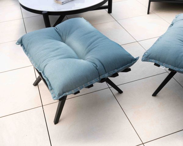 Tumbona de alta gama en turquesa y negro con reposapiés modular «Lisca»