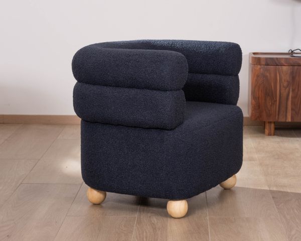 Pequeño sillón envolvente de tela azul oscuro «Wala»