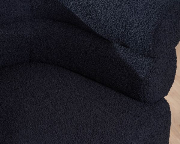 Pequeño sillón envolvente de tela azul oscuro «Wala»