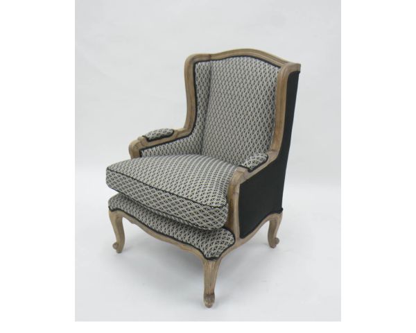 Sillón bergère «Sofía» de madera maciza y tela blanca y negra con rombos